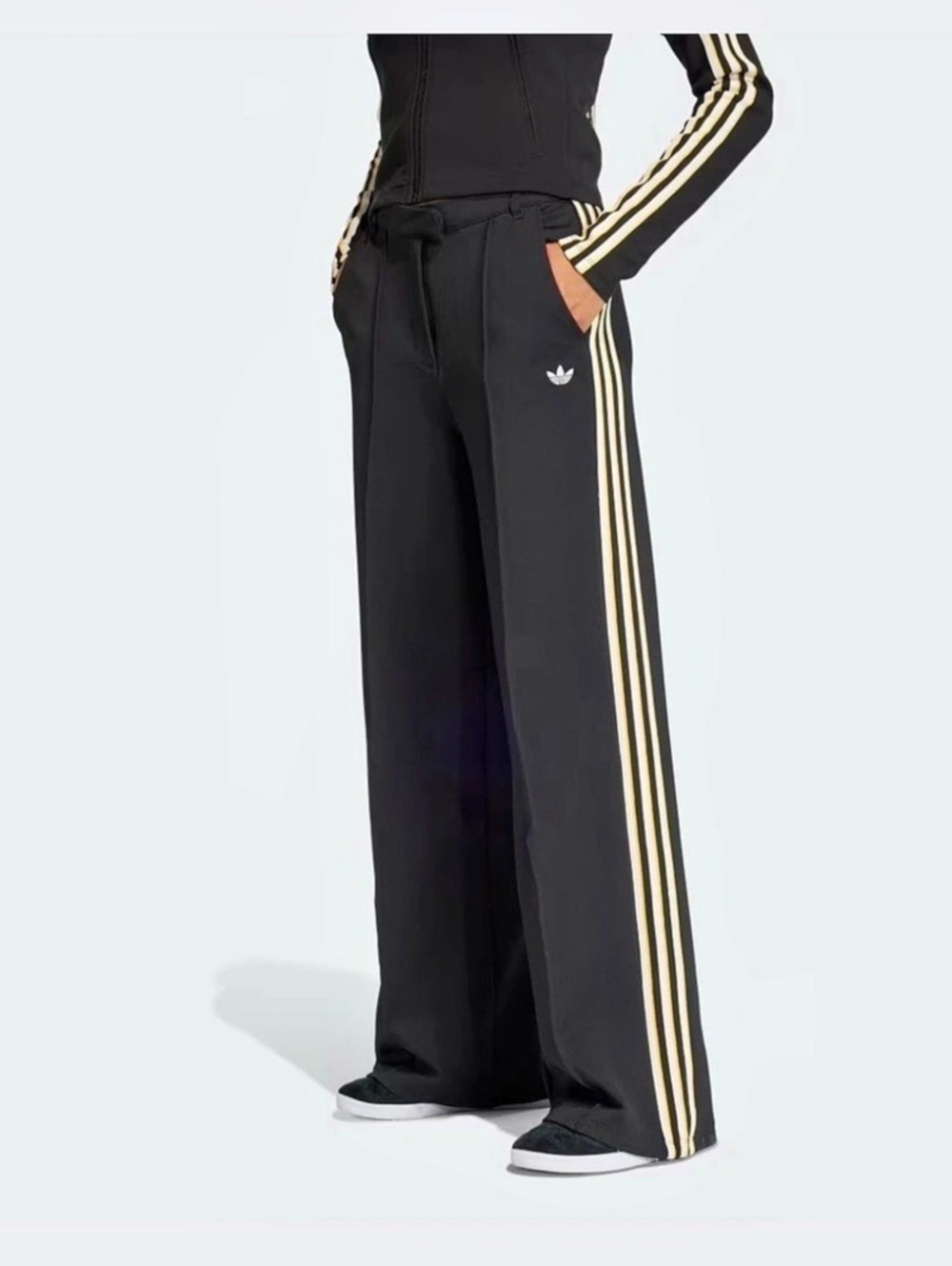 Adidas - New with Tags SPORT TAILORED PANTS
Loose-fit pants with 90s inspiration